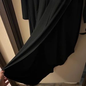 NWT City Chic dress with a side slit and 3/4 long sleeved.